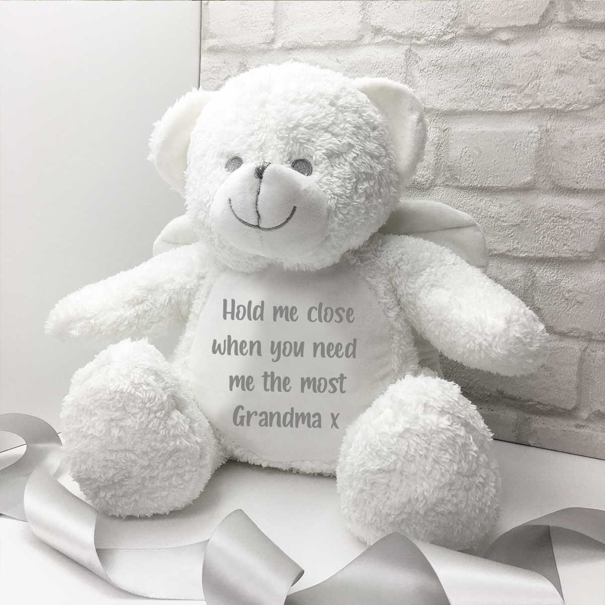 White teddy bear with 2024 wings