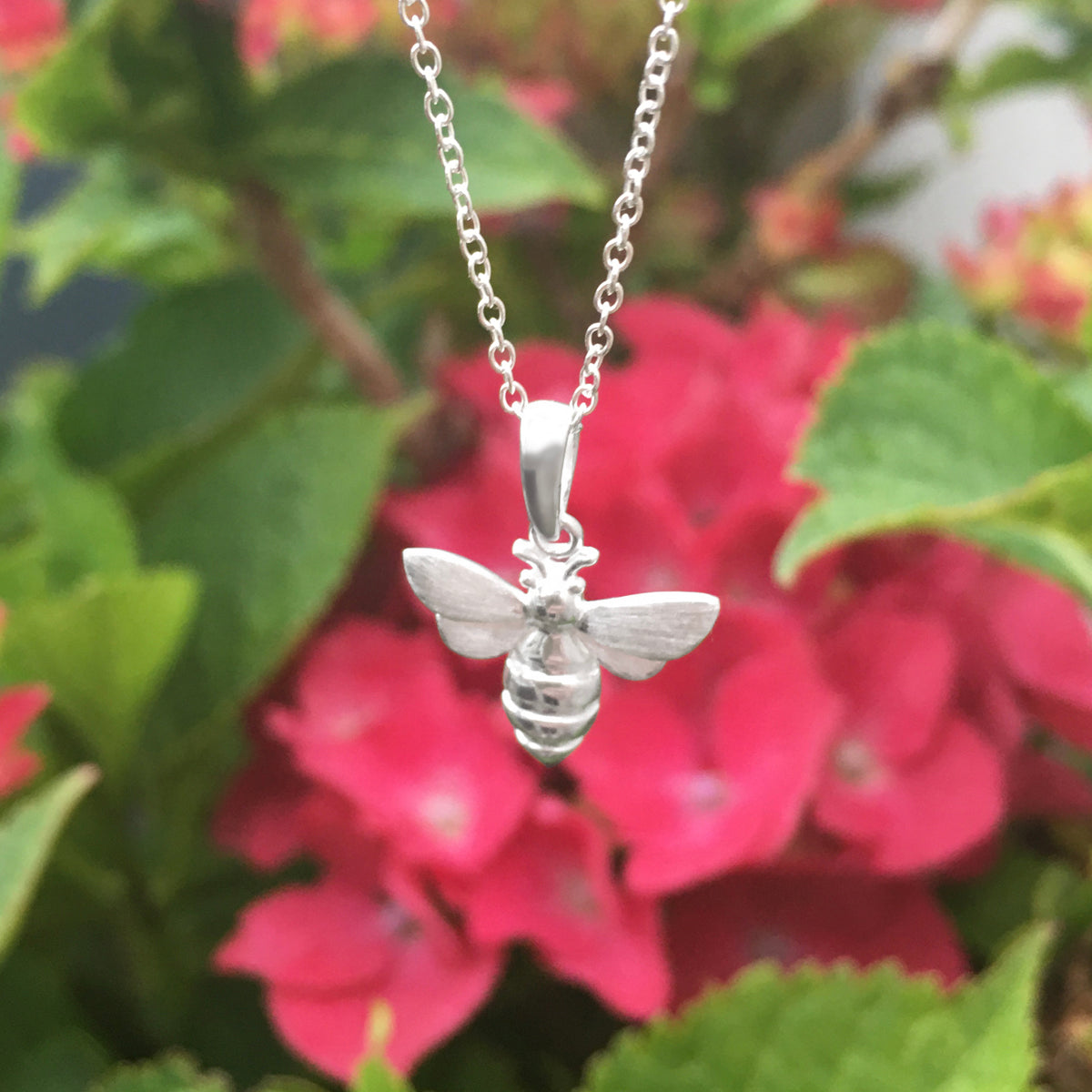 Sterling silver store bee necklace