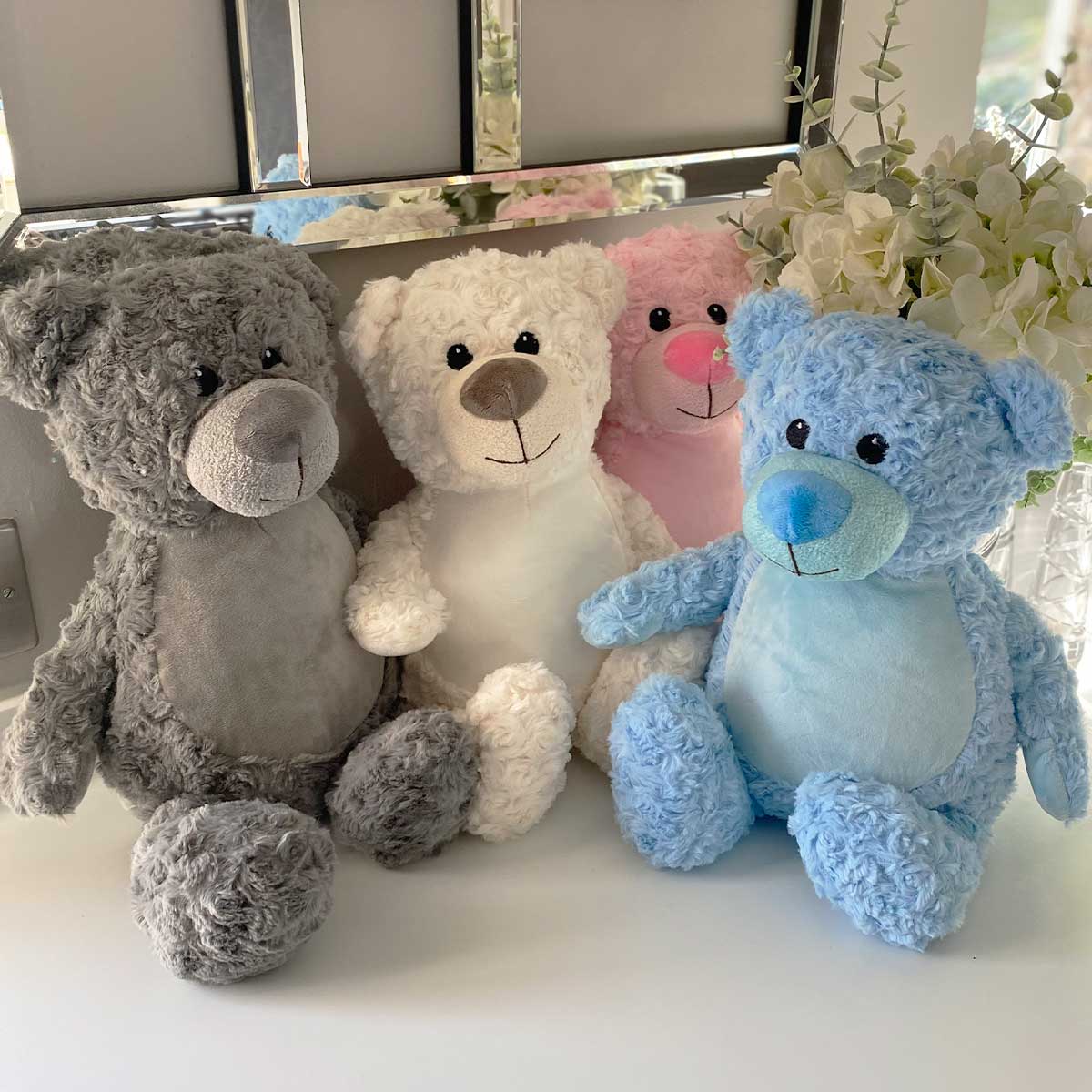 Blue and 2024 white teddy bear