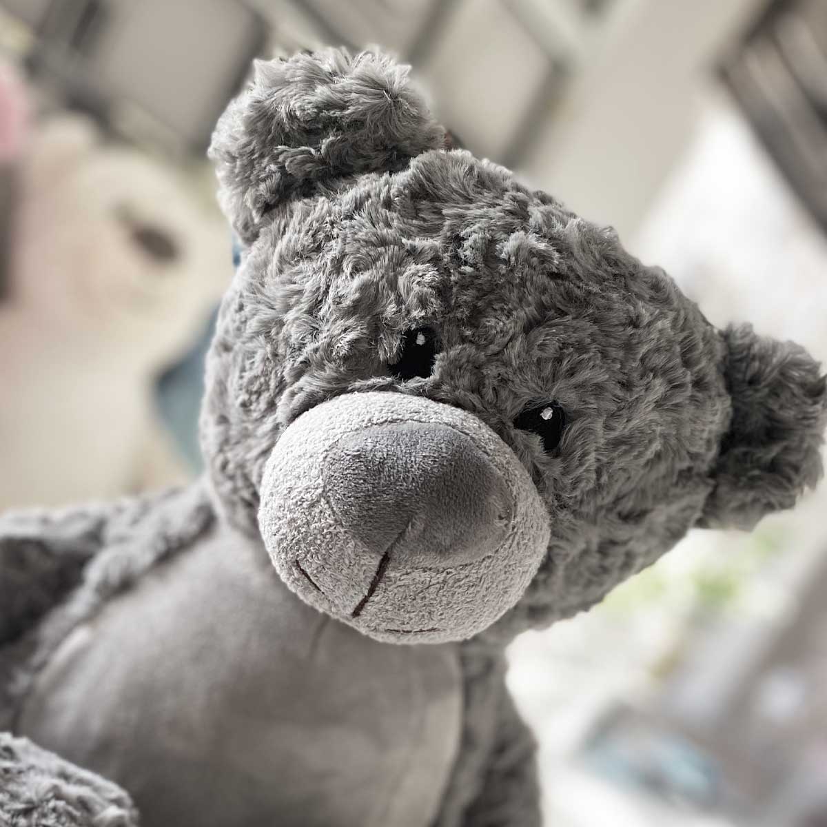 Grey teddy sales bear with patches