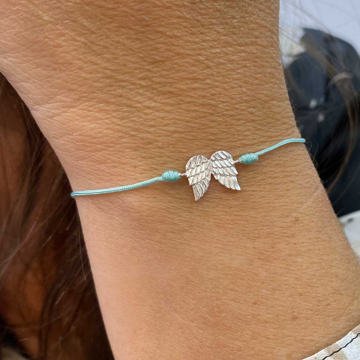 Angel hot sale feather bangle